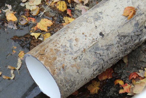 A pipe showing a white lining inside.